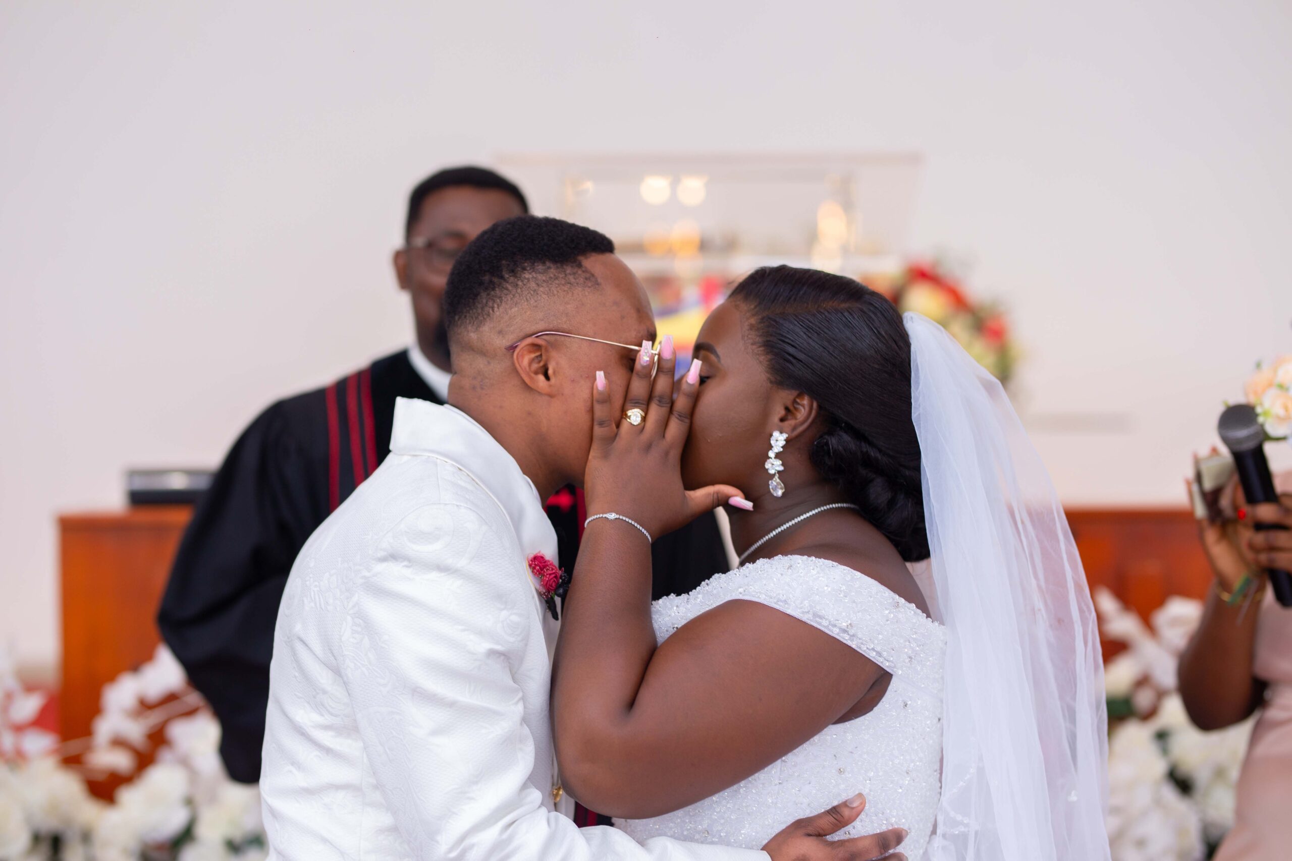 Bride and Groom sharing their first kiss