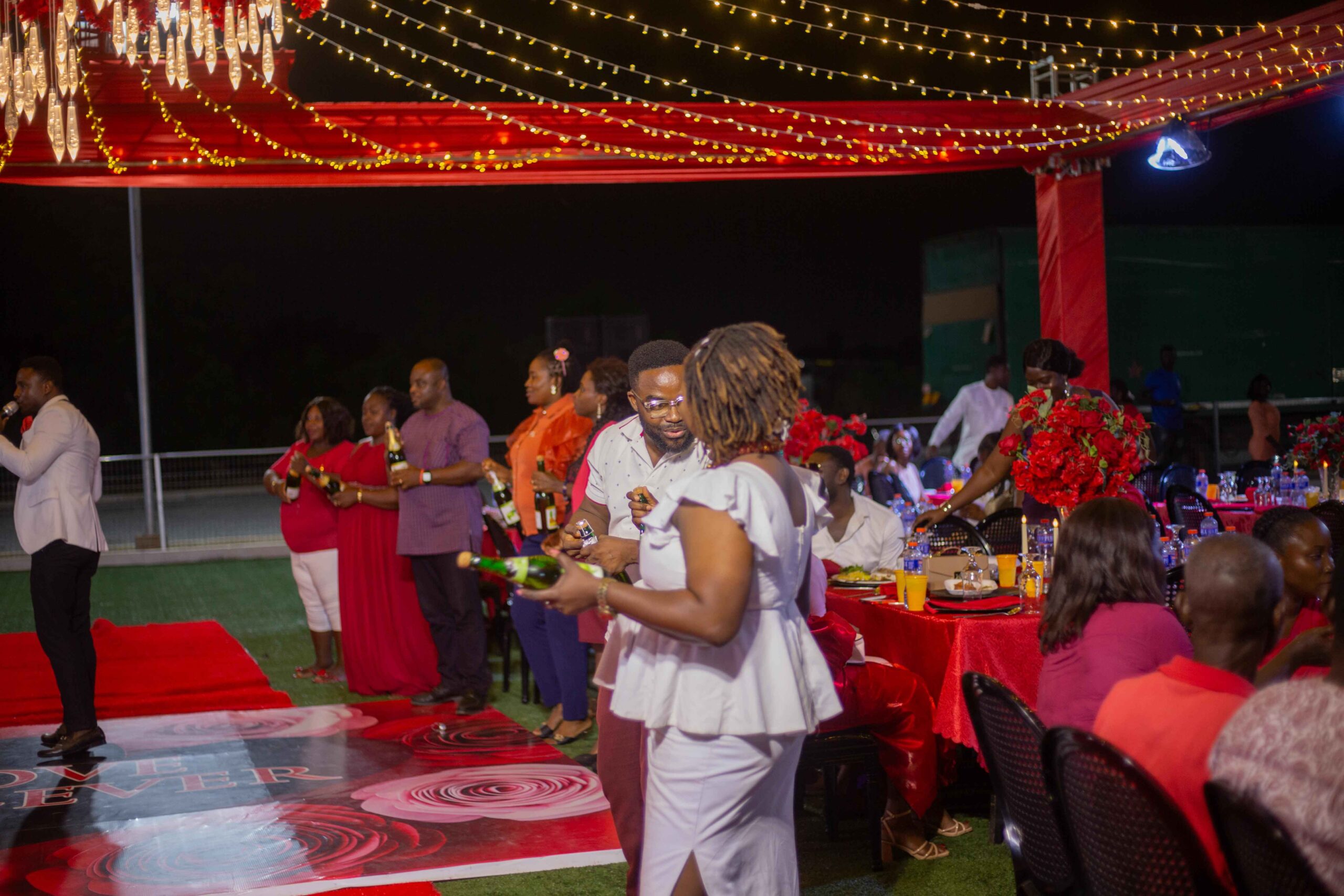 A Valentine’s Day event decorated with red and heart-themed décor.