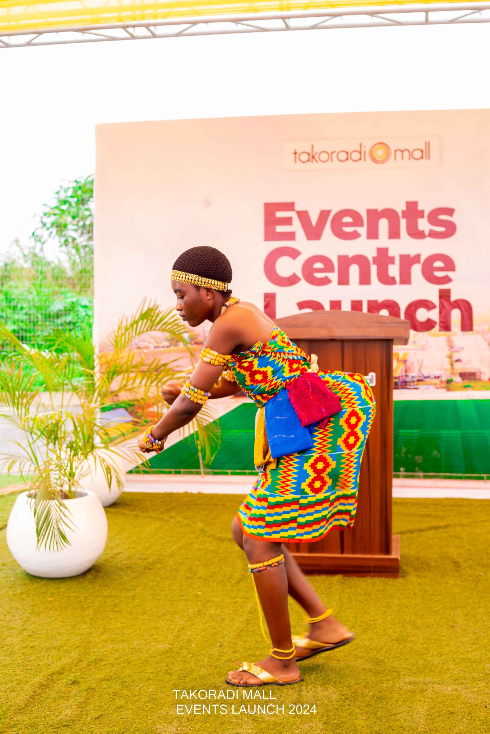 Young girl performing a traditional cultural dance at the Takoradi Mall Event Centre launch.